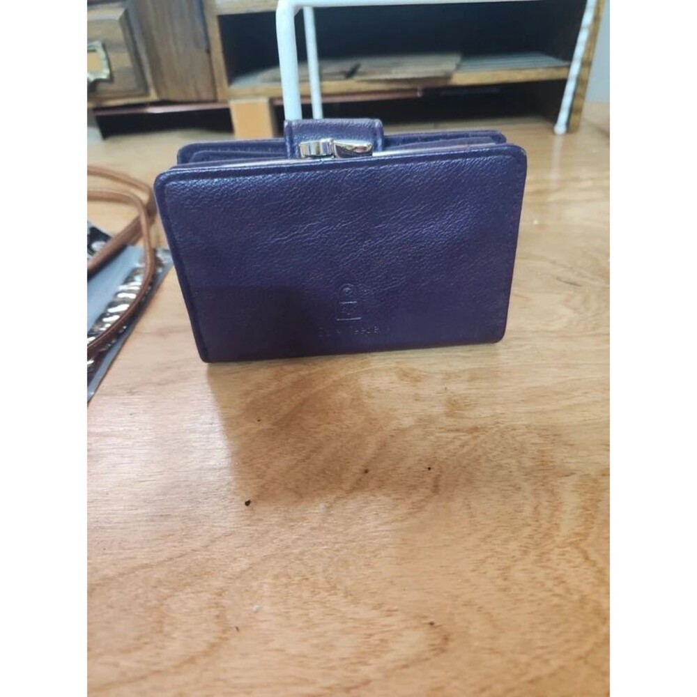Purple wallet with safe keeper